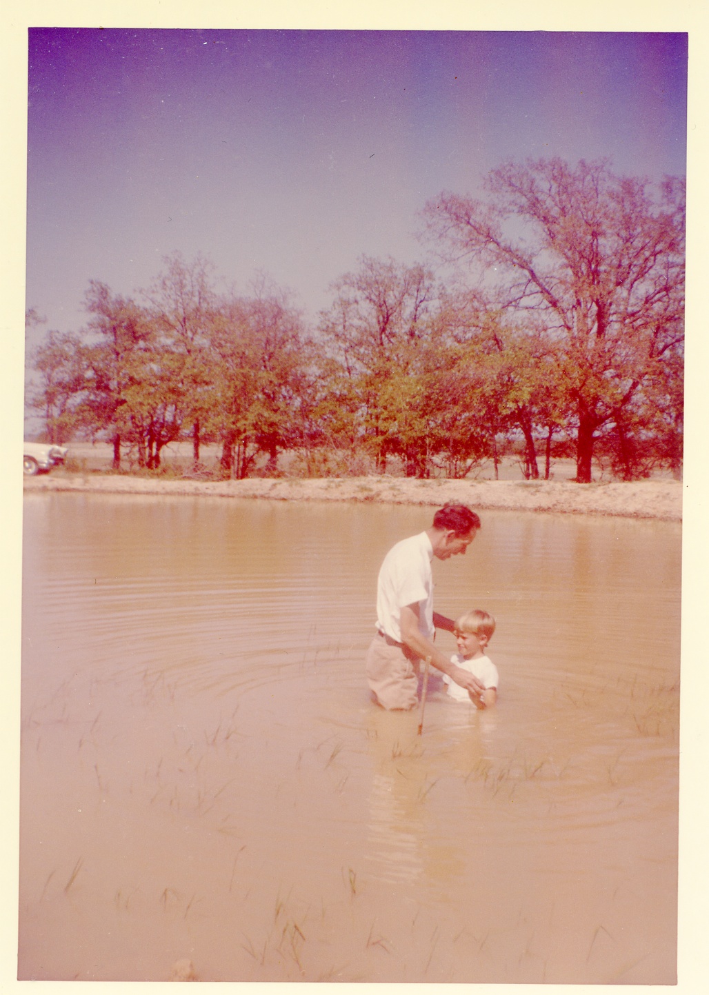 Dad baptizing my brother Darrel 